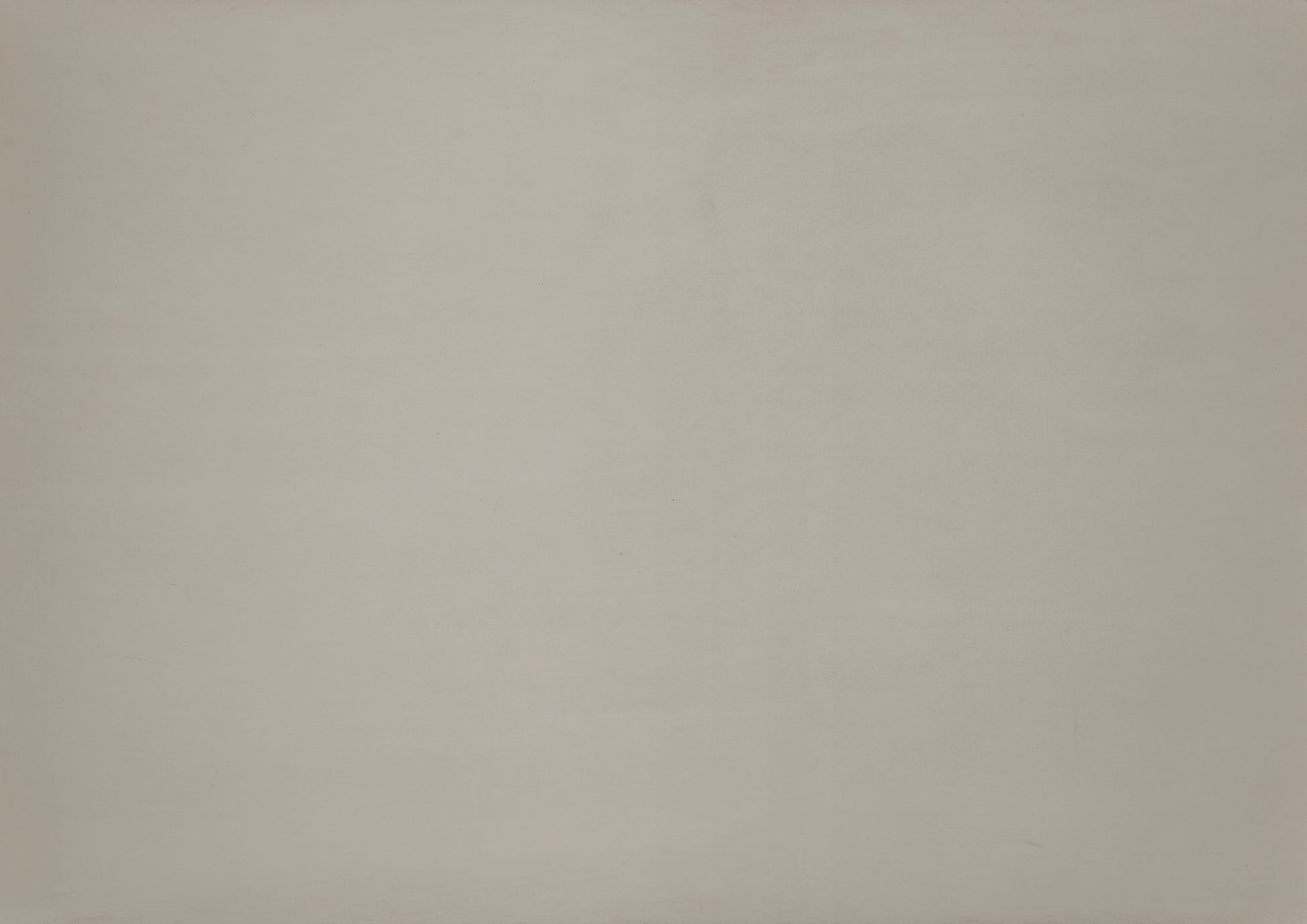 A closeup of a plain light beige textured background suitable for product backdrops