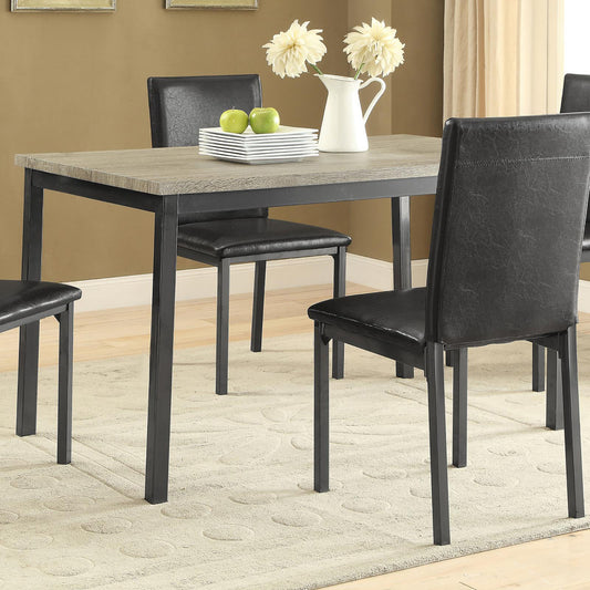 Modern dining table with weathered oak finish and black metal legs seating four
