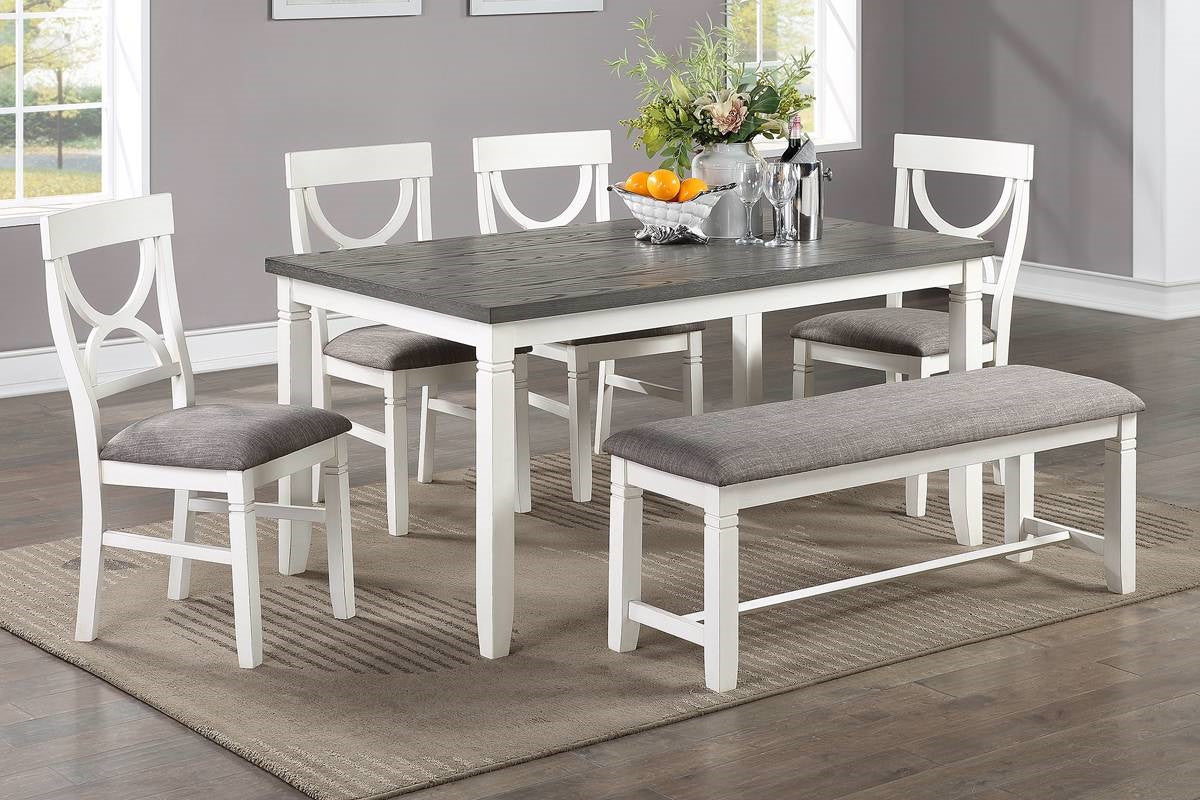 White and gray farmhouse dining set with upholstered bench and chairs