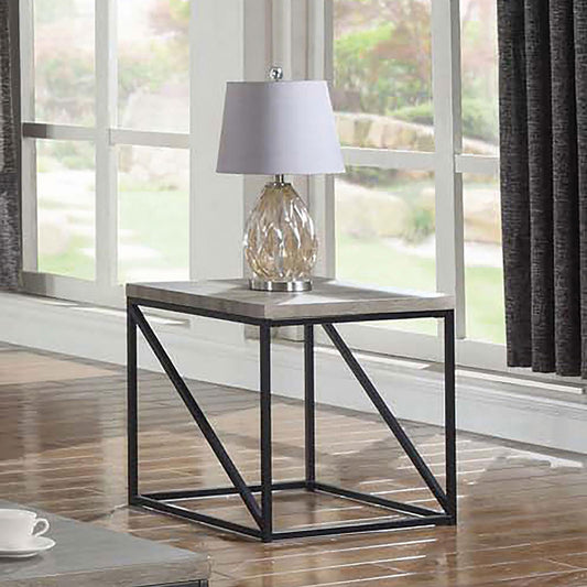 Modern grey wood end table with black metal frame and clear glass lamp