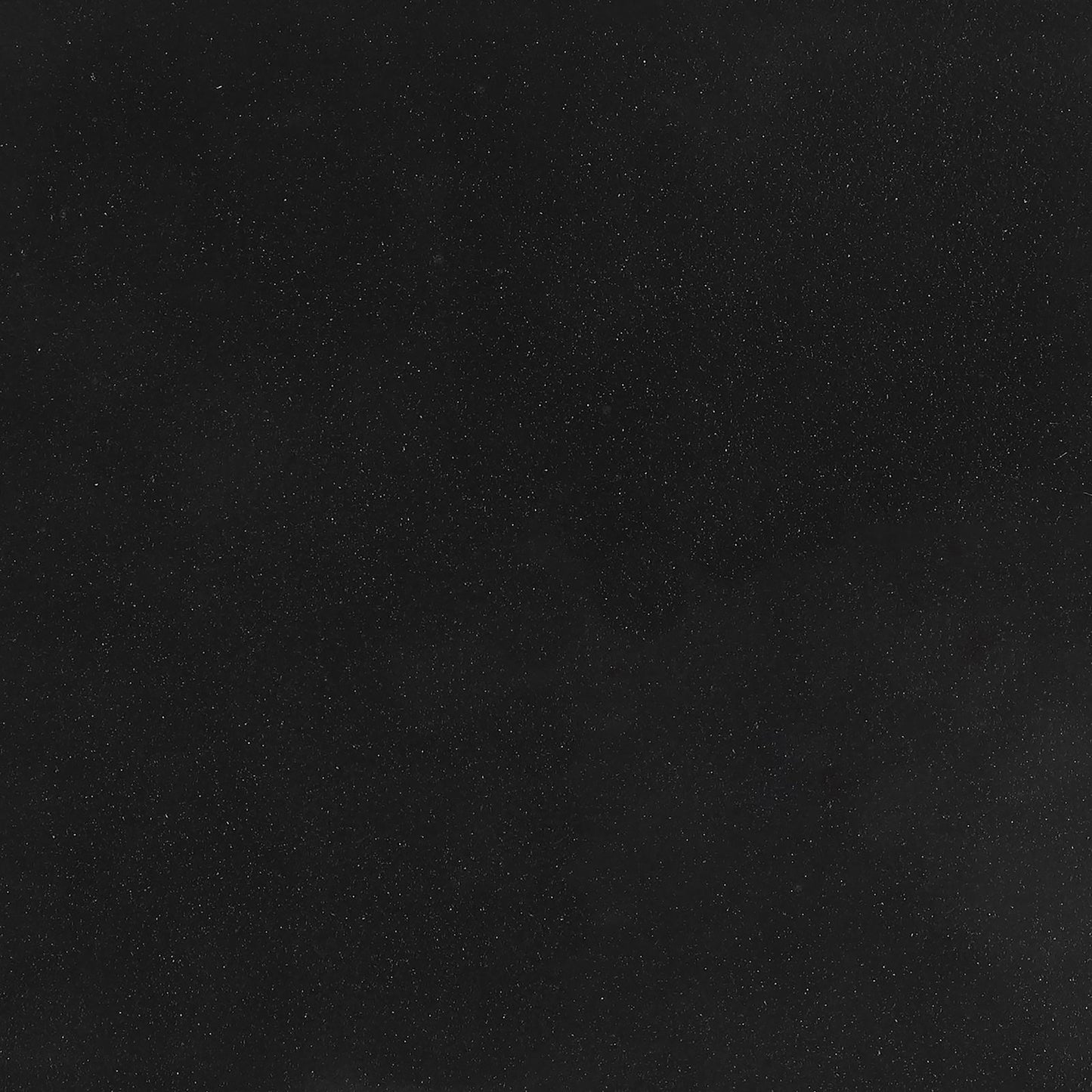 Textured black fabric with subtle sparkle ideal for evening wear