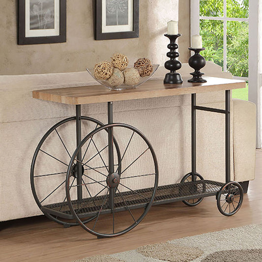 Rustic wood console table with large spoked wheels and black metal frame