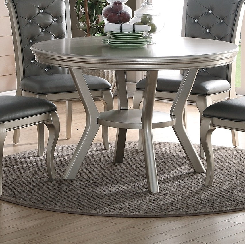 Silver round dining table with tufted grey chairs elegant and modern furniture set