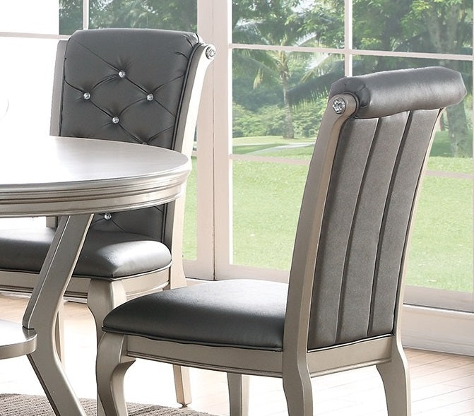 Tufted grey leather dining chair with crystal accents and silver legs
