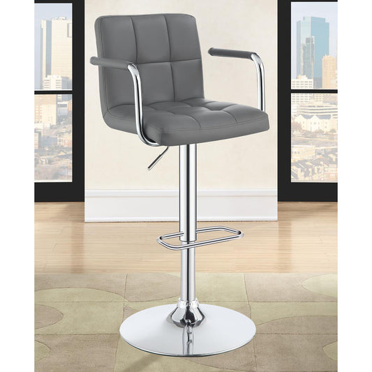 Grey upholstered bar stool with tufted seat and chrome base