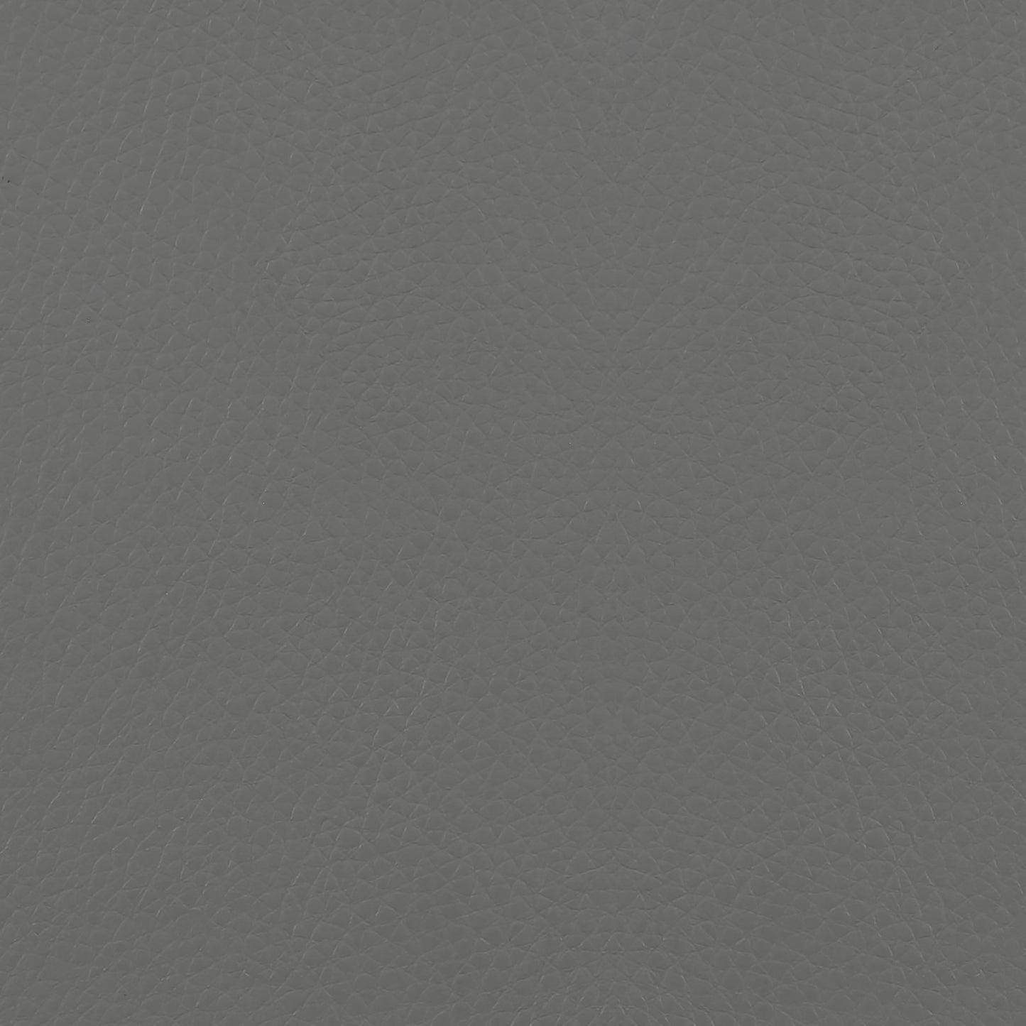 Closeup of textured grey leather upholstery material perfect for furniture