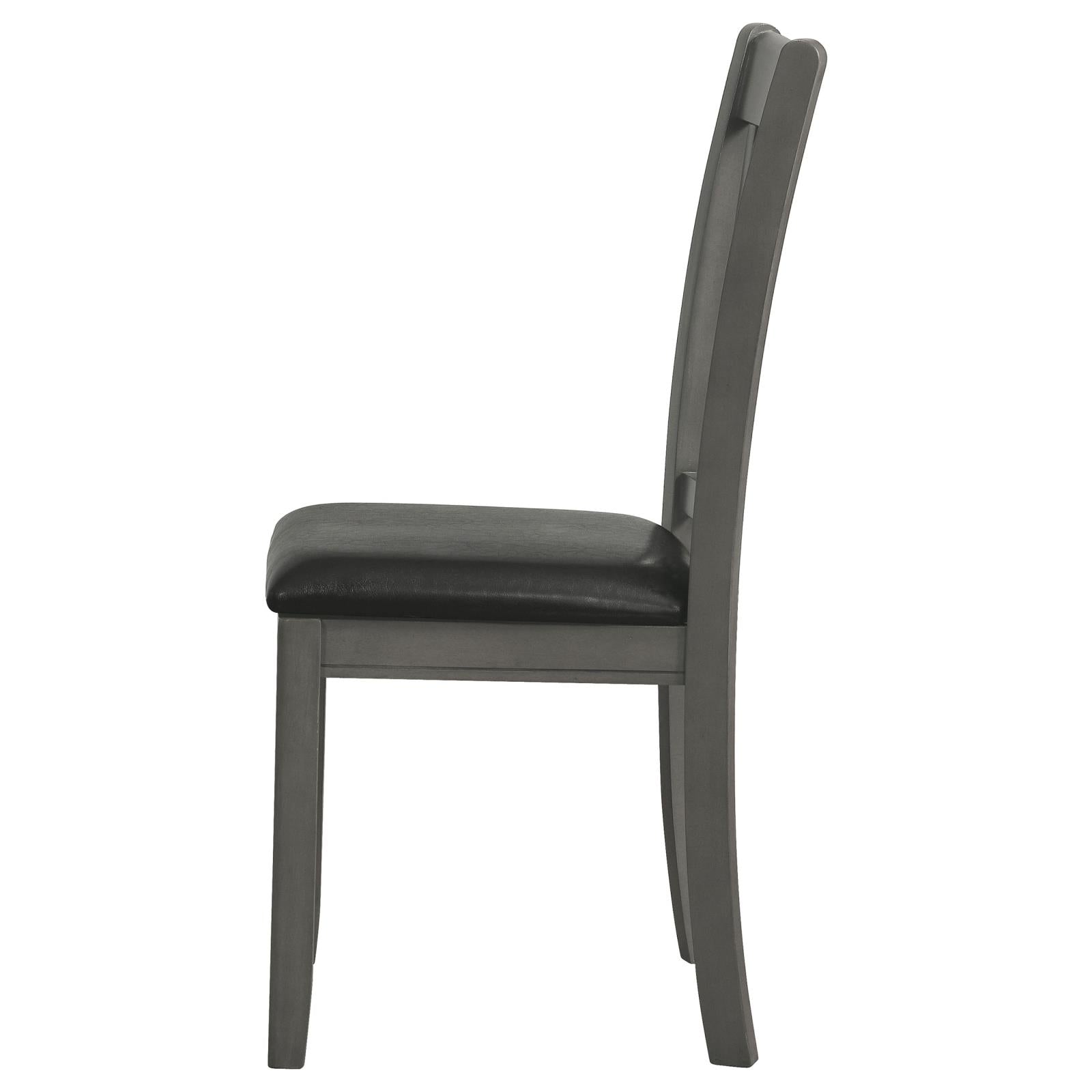 Grey upholstered dining chair with wooden frame side view