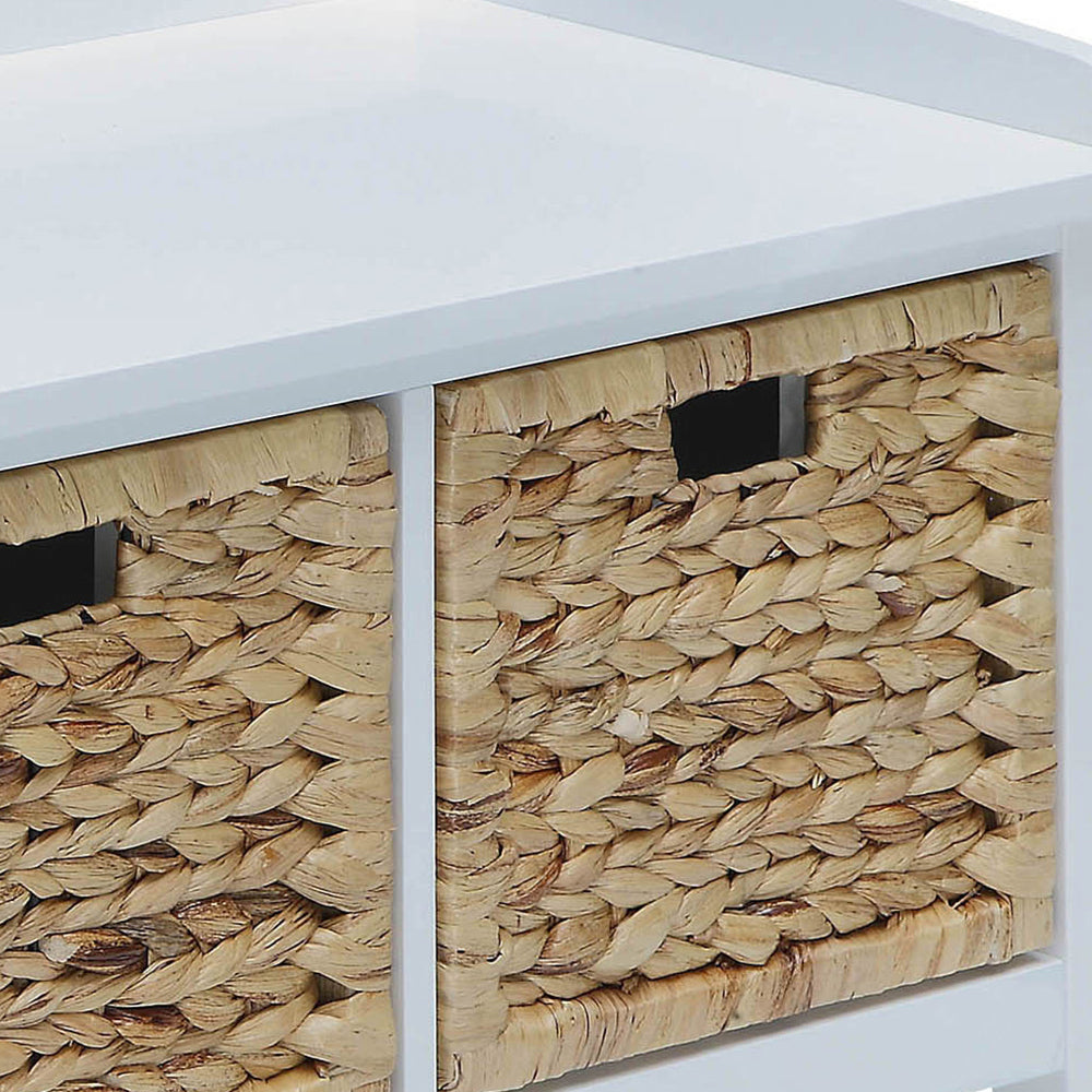 White wood shelving unit with two woven hyacinth storage baskets