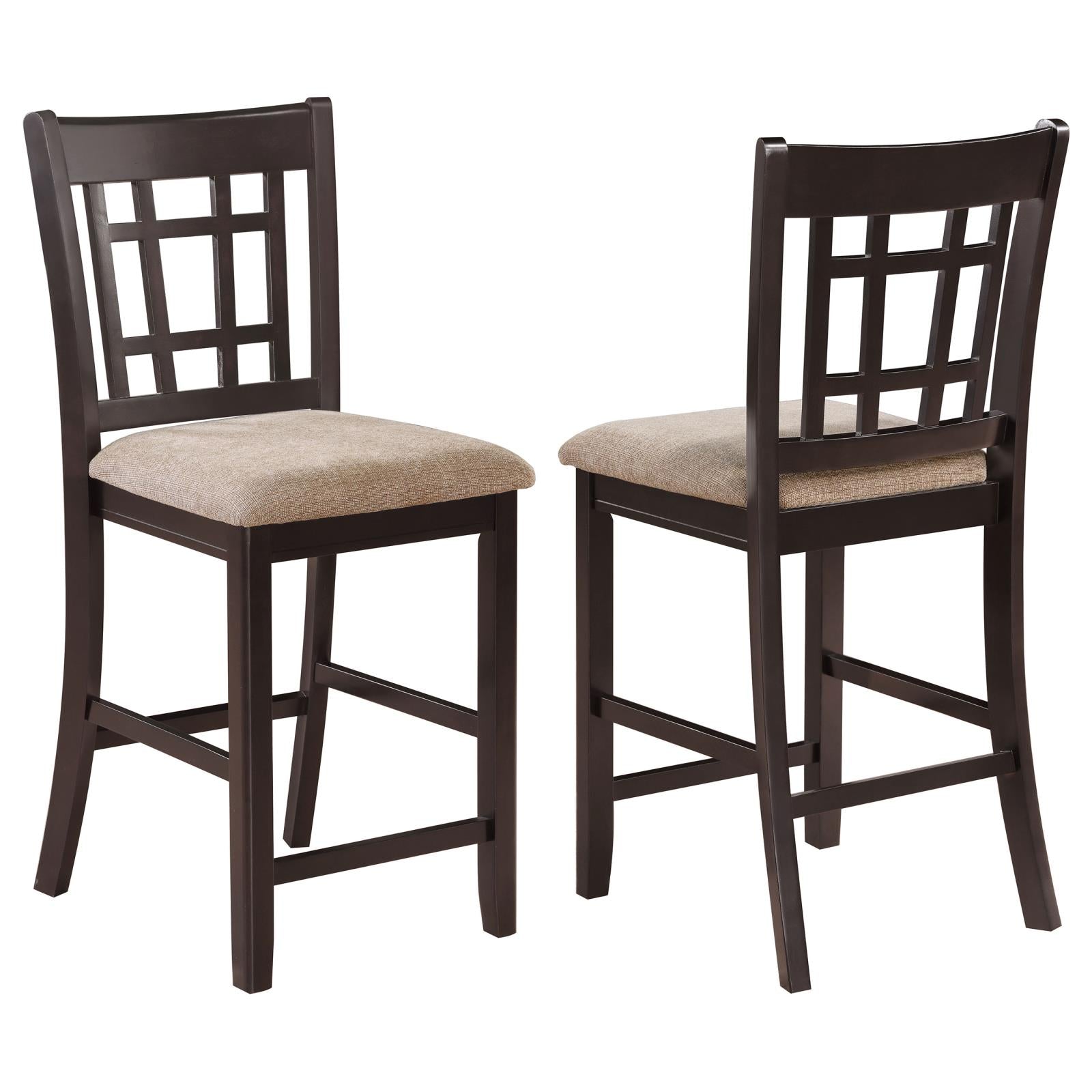 Dark brown wooden bar stools with tan fabric seats and lattice backrest
