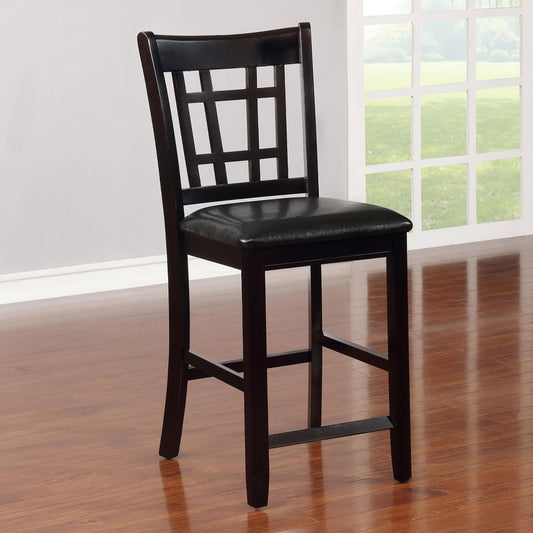 Dark wood bar stool with padded black seat and geometric backrest