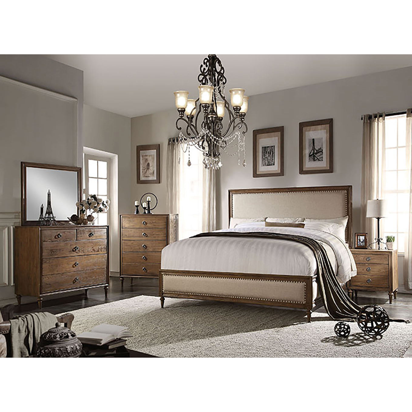 Elegant upholstered king bed frame with nailhead trim and dark wood accents