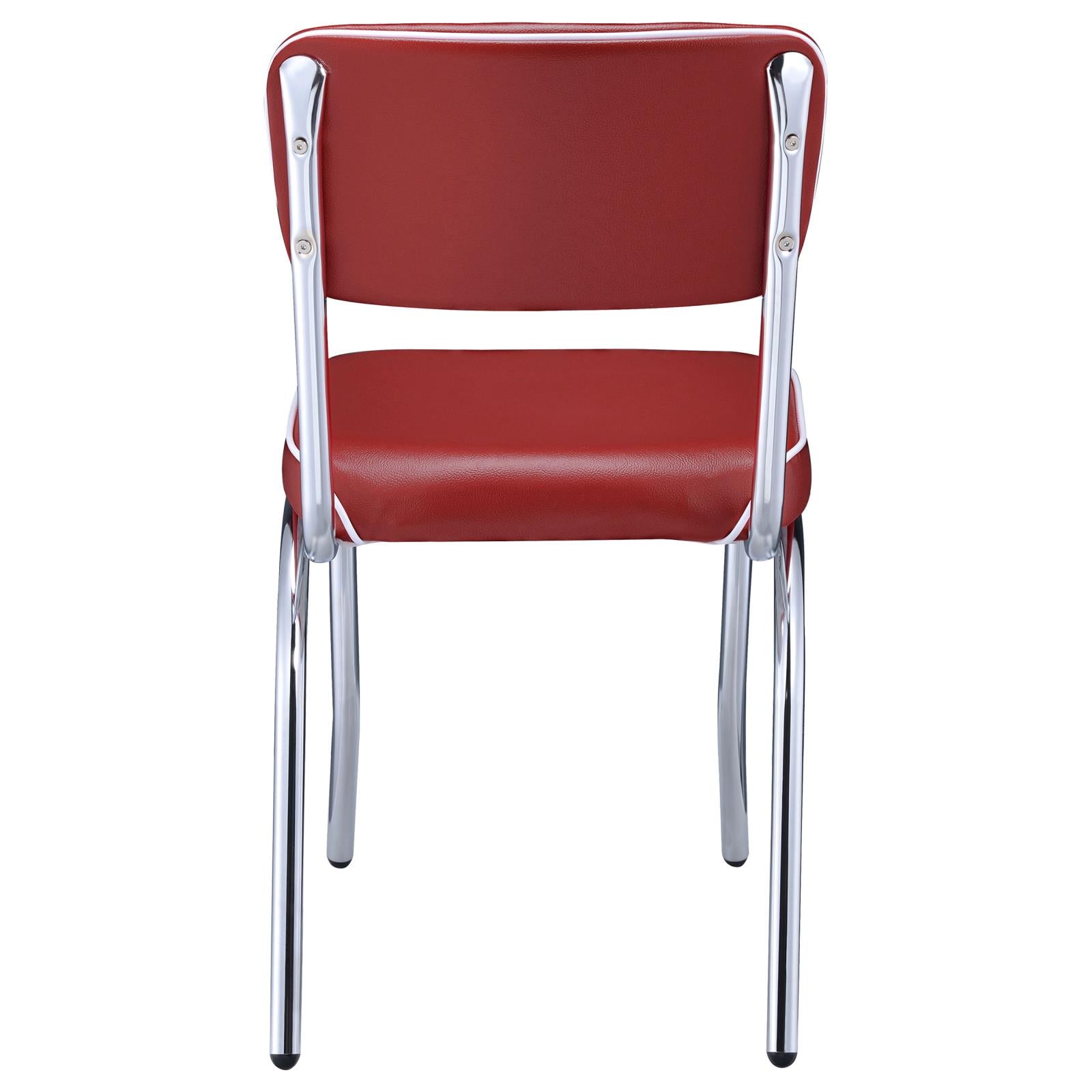 Red vinyl diner chair with chrome legs and white piping detail