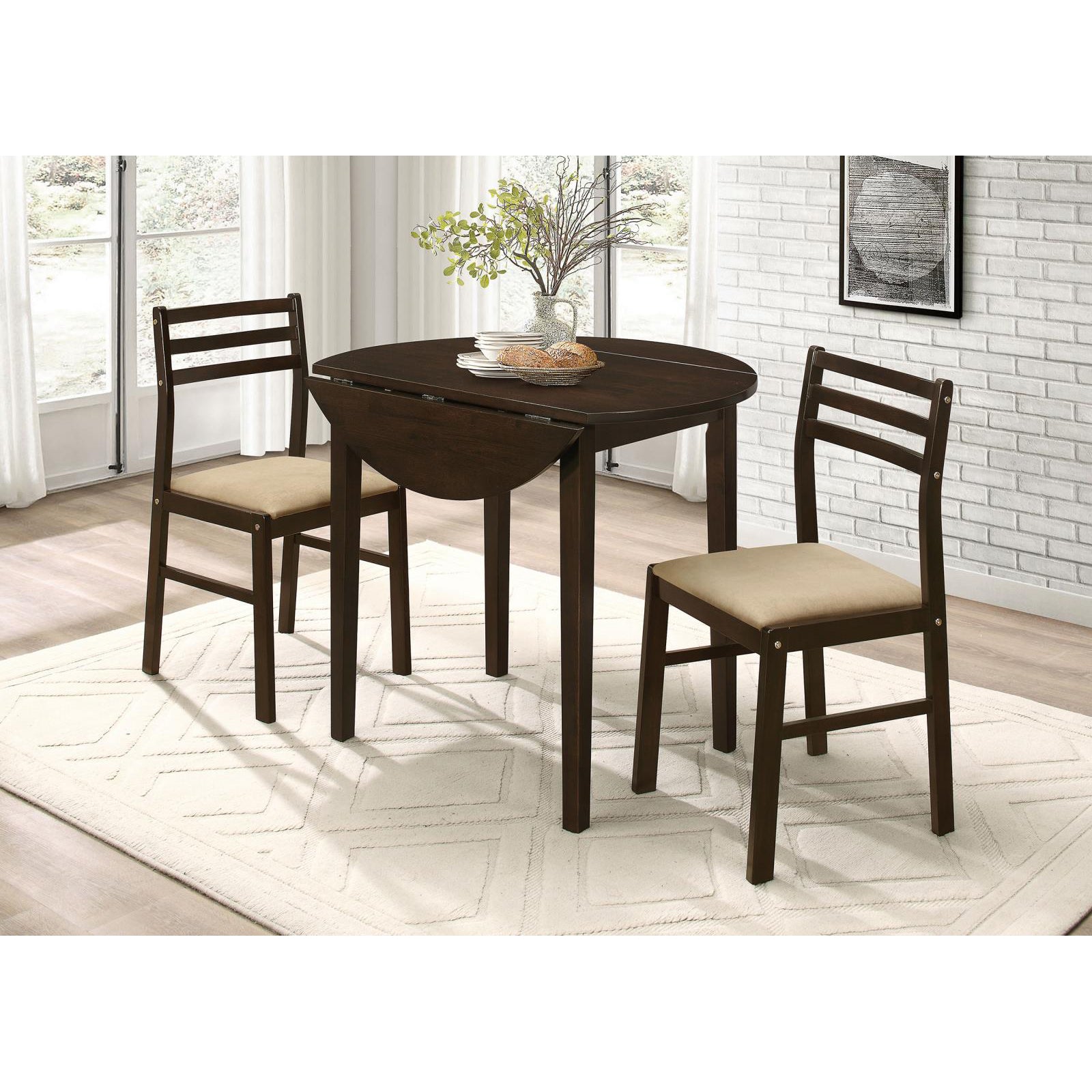 Dark wood oval drop leaf dining table with two upholstered chairs