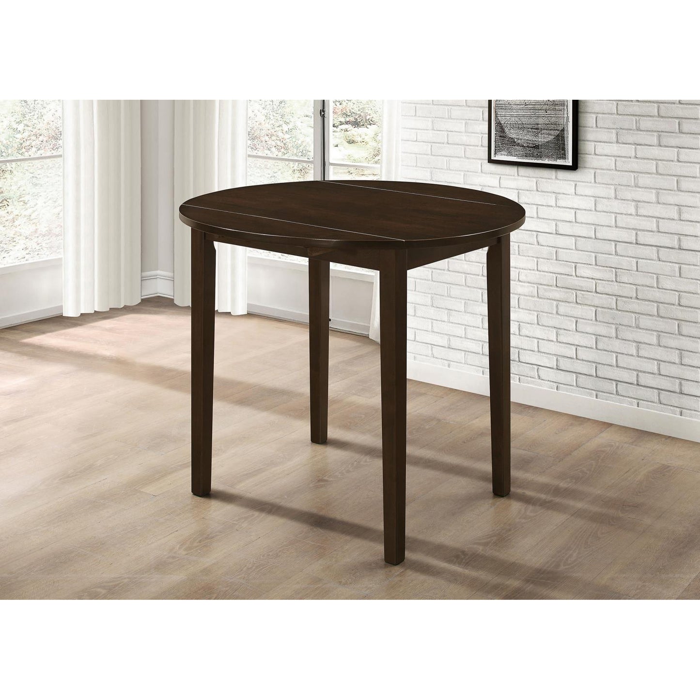 Dark espresso oval dining table with tapered legs ideal for compact kitchens