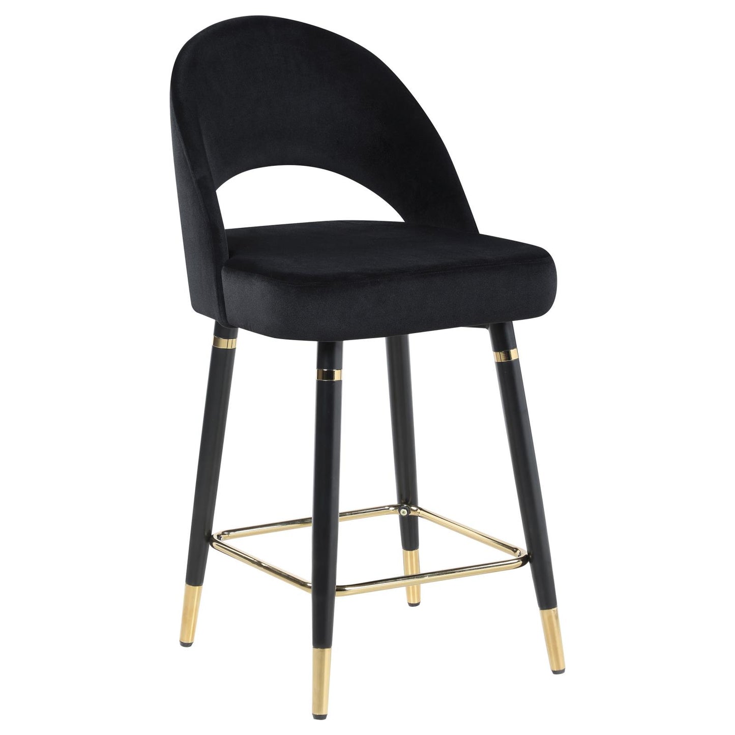 Black velvet counter stool with cutout back and gold footrest