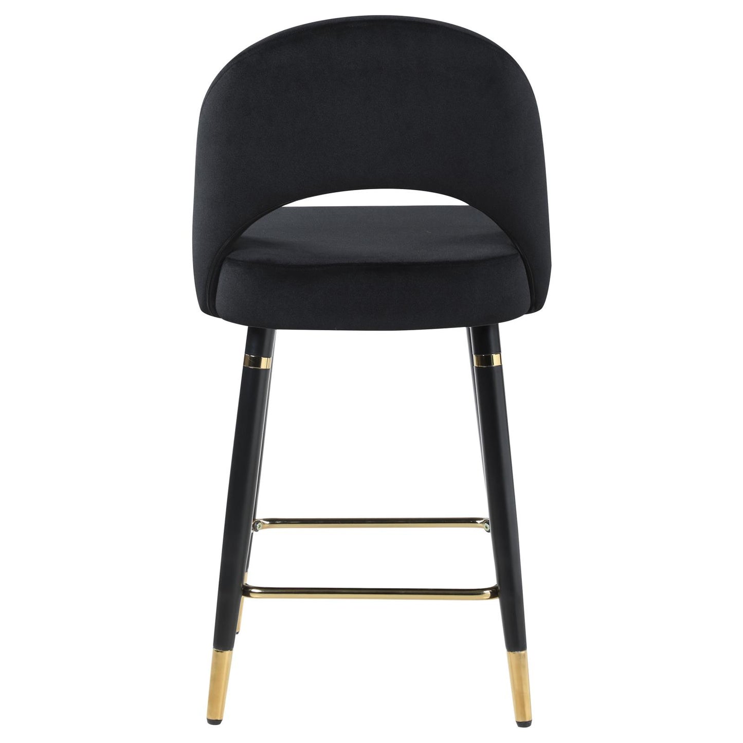 Black velvet bar stool with curved back and gold accents for modern kitchens