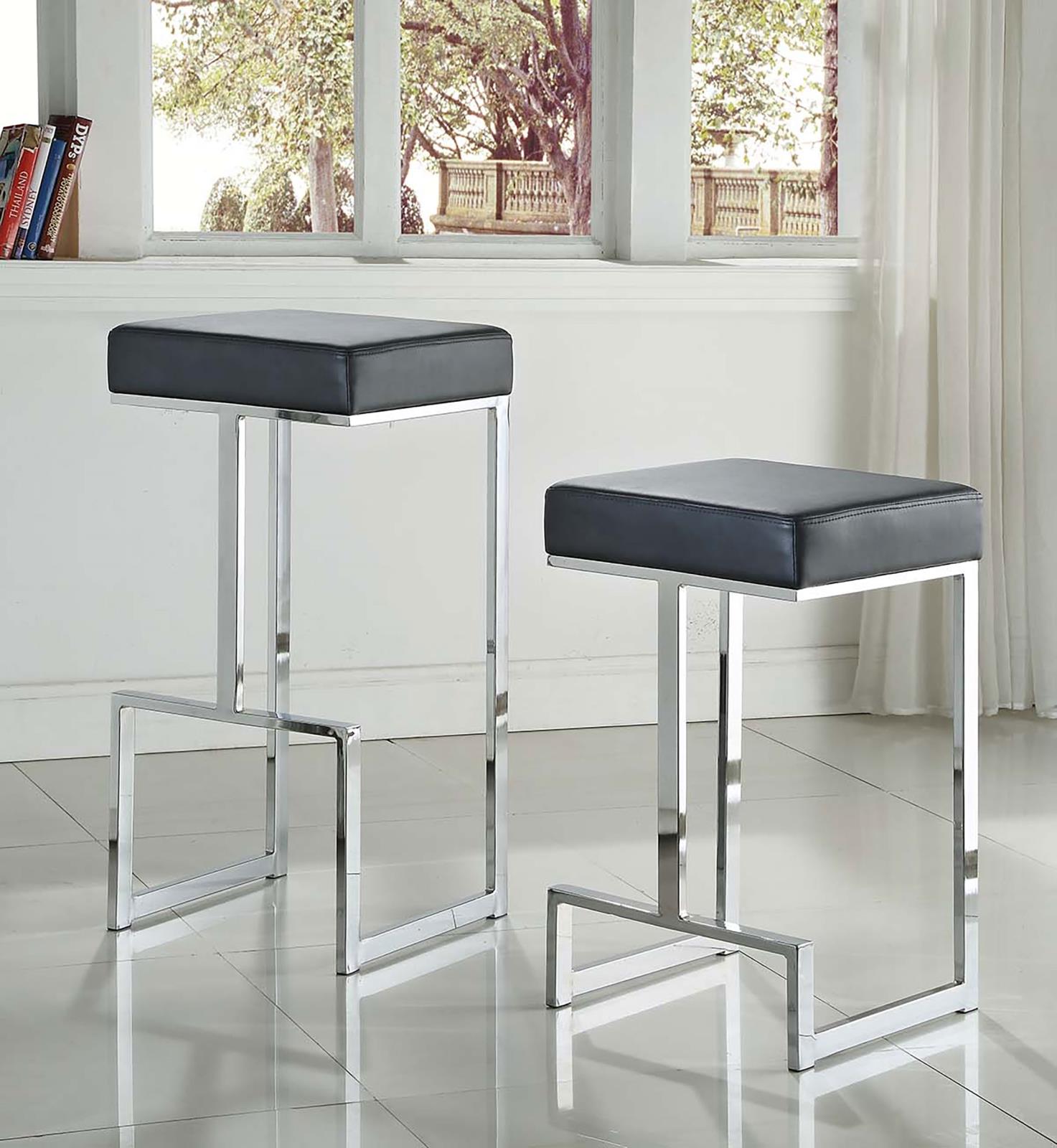 Modern black faux leather bar stool with polished chrome legs