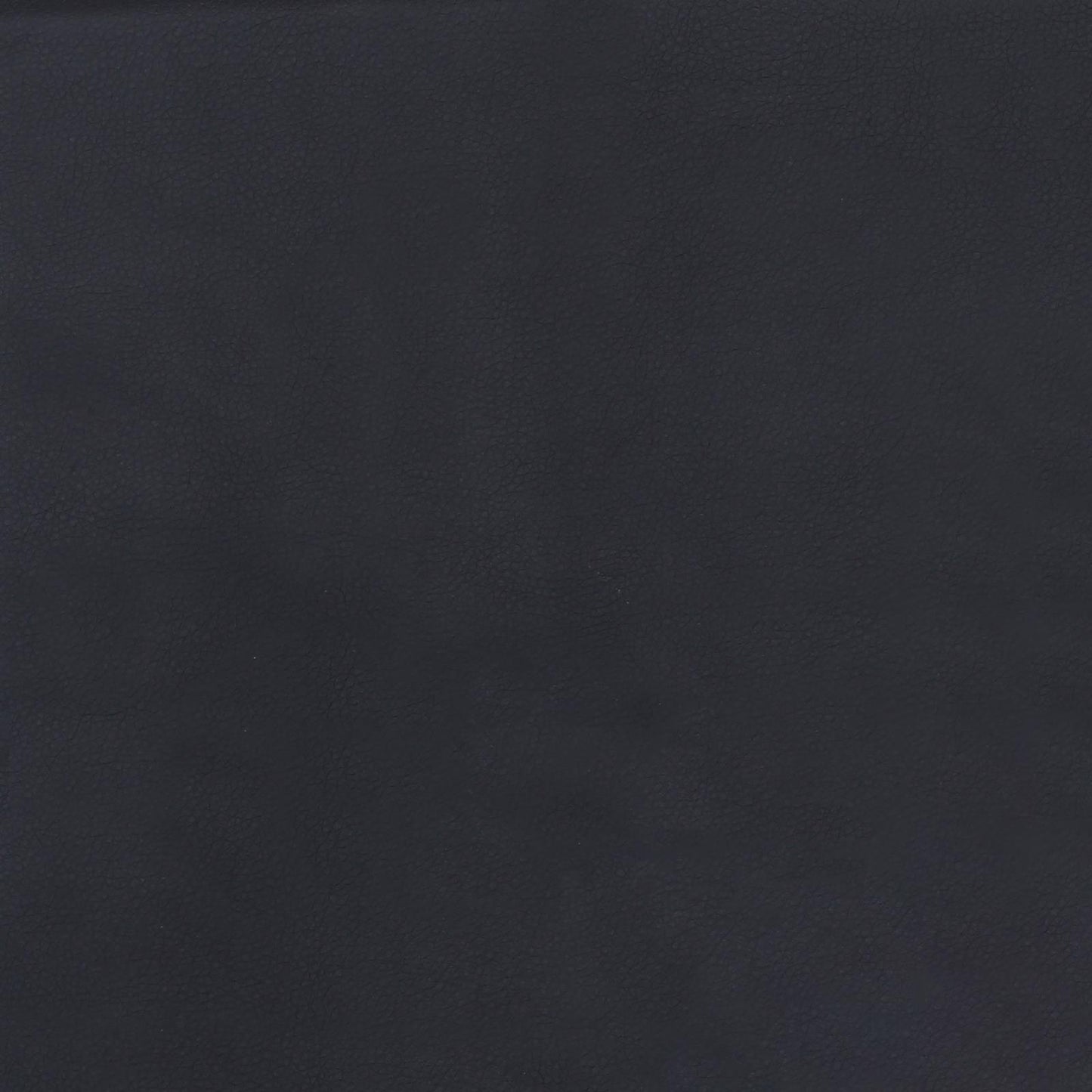 Dark gray pebbled leather texture detail perfect for upholstery and fashion accessories