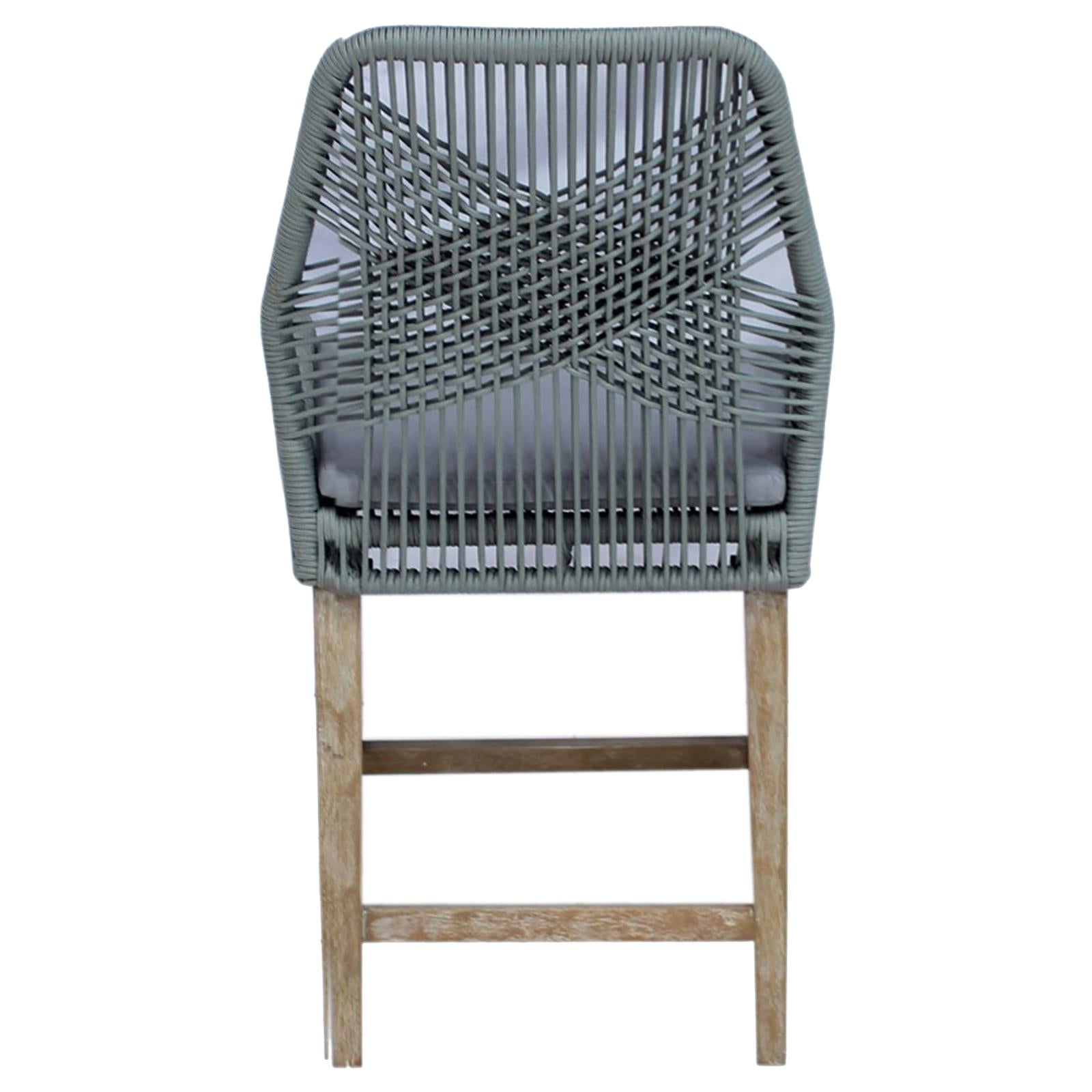 Grey woven back bar stool with wooden legs and grey cushion