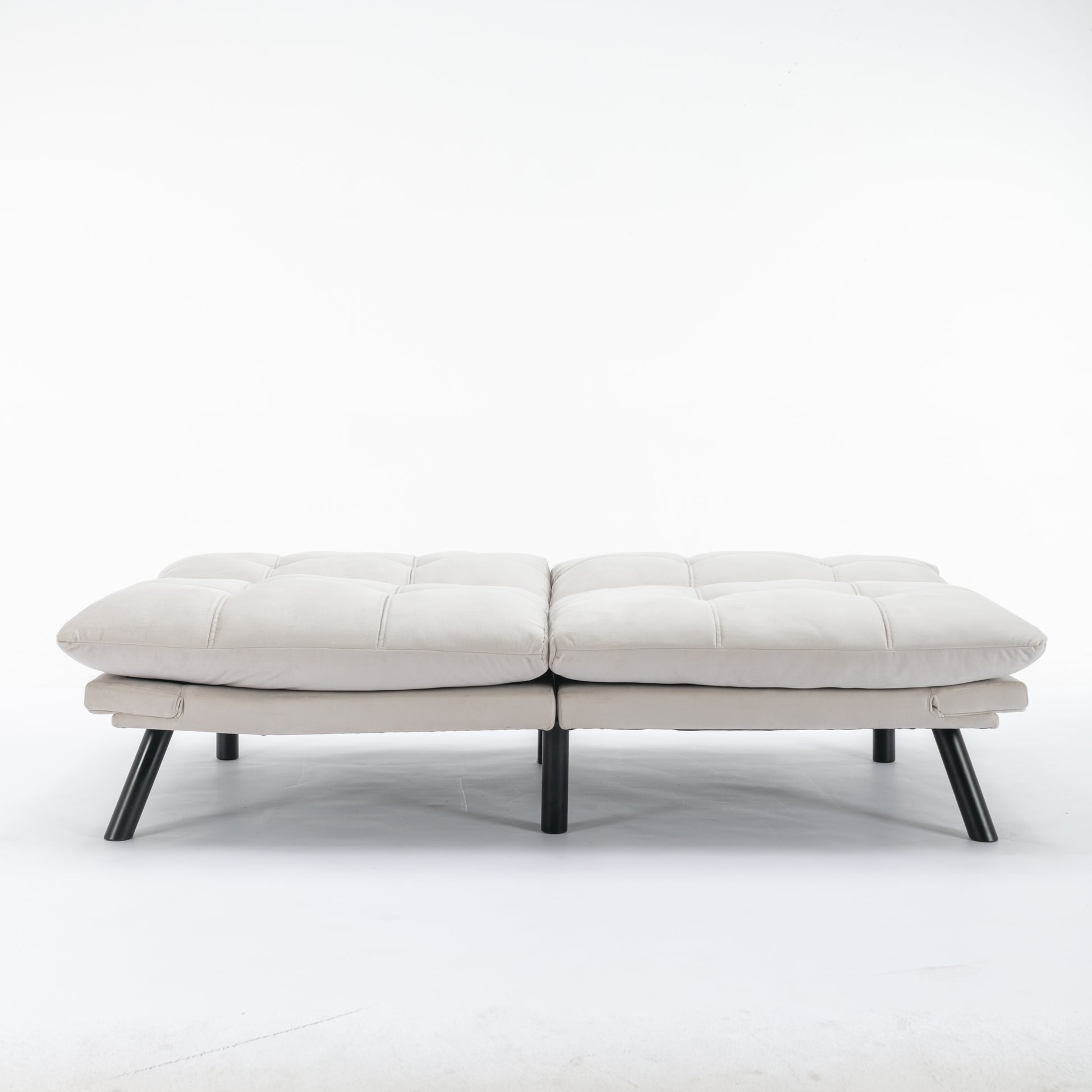 Tufted light gray velvet futon sofa with modern black metal legs