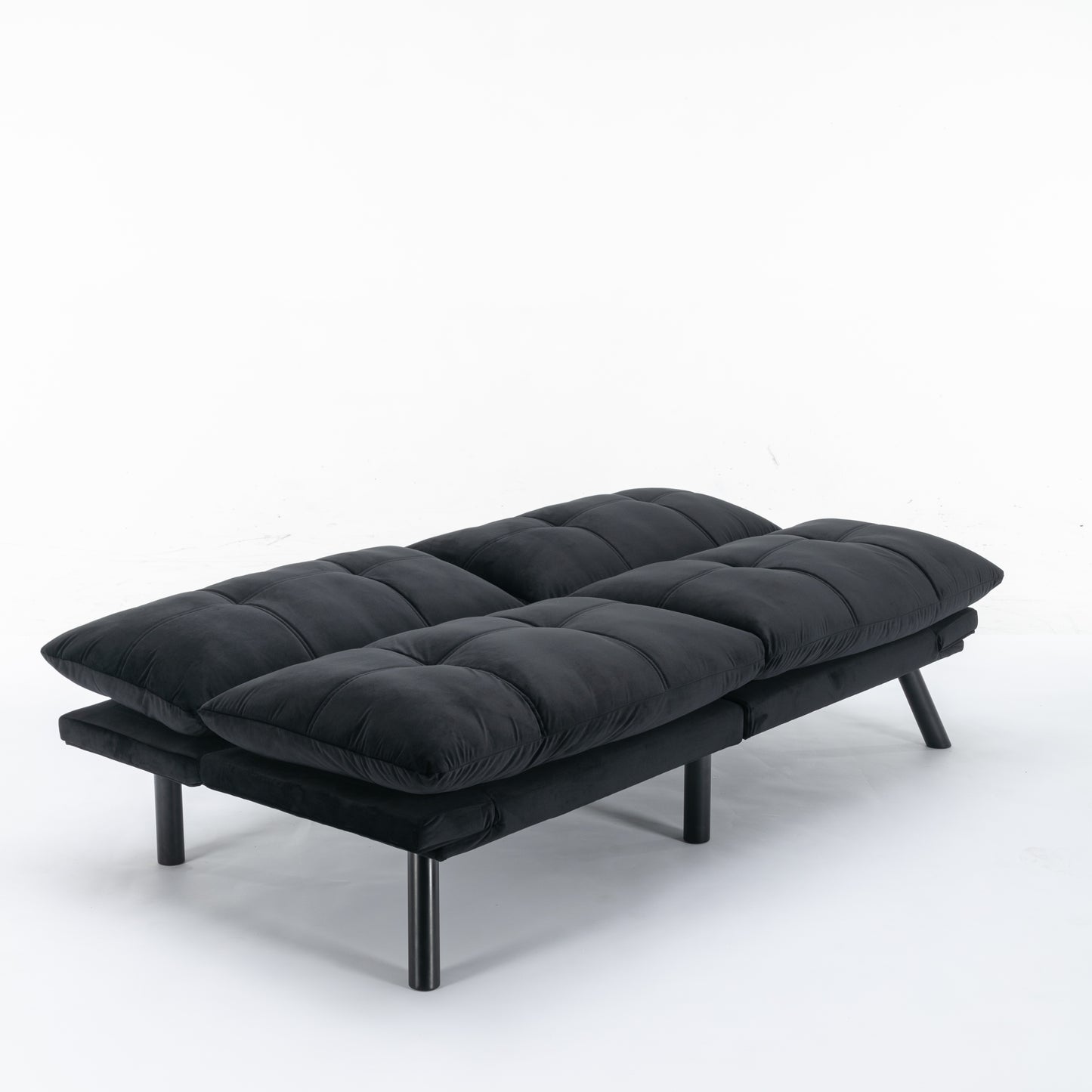 Black velvet futon sofa with tufted cushions and modern black legs