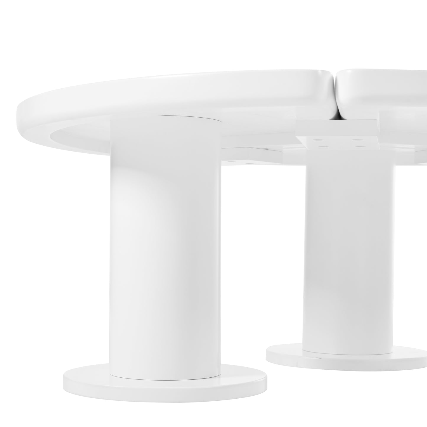 Closeup of a sleek modern white pedestal dining table base with clean lines