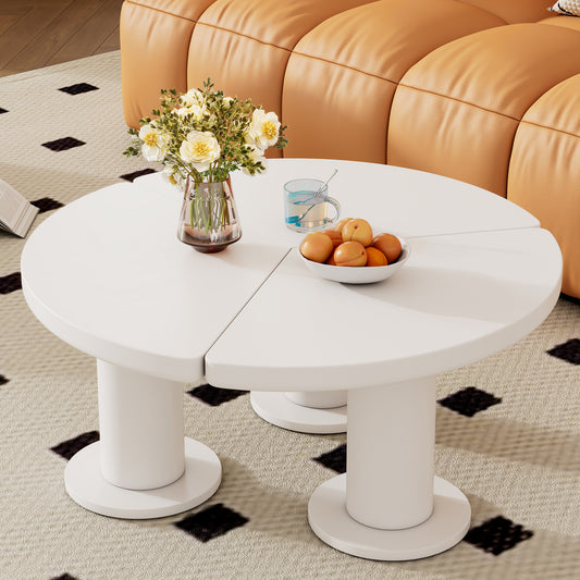 Modern white pedestal coffee table with a unique segmented top for living room decor