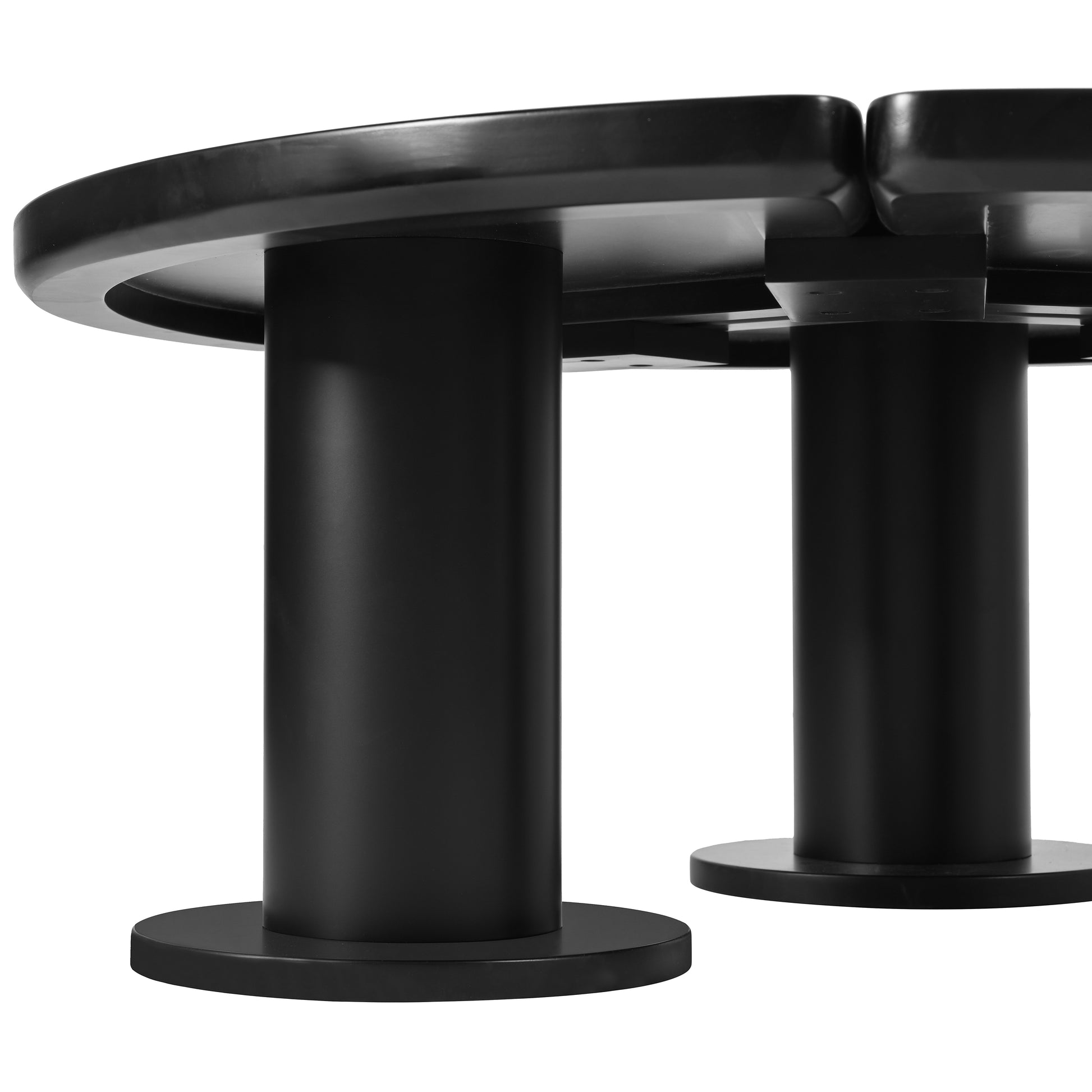 Black modern dining table circular design with sturdy cylindrical legs and wide bases