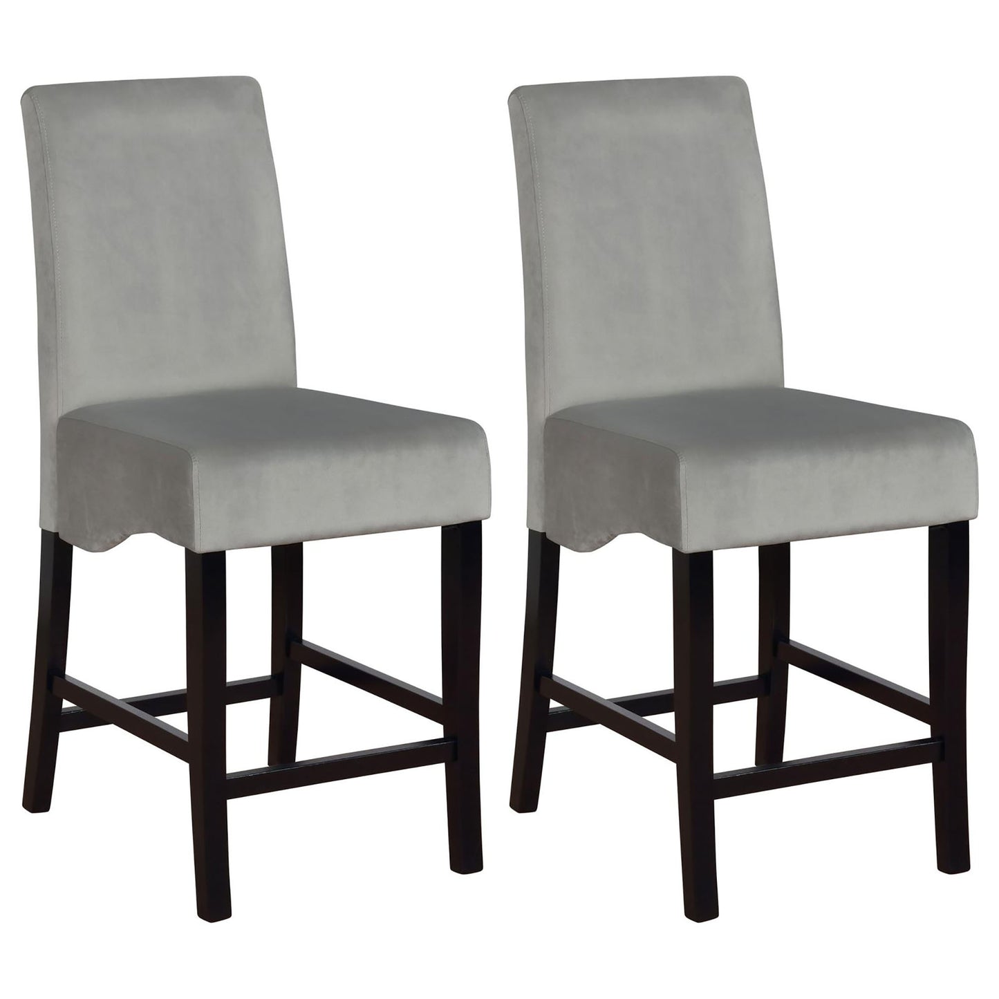 Two plush grey velvet upholstered bar stools with dark wooden legs