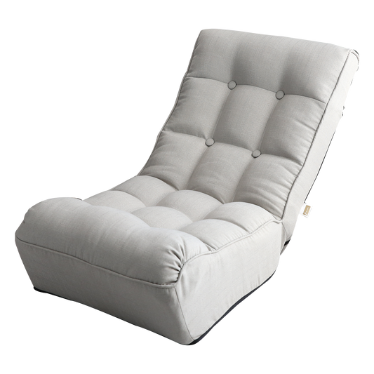 Light gray tufted floor chair with linen upholstery for comfortable seating