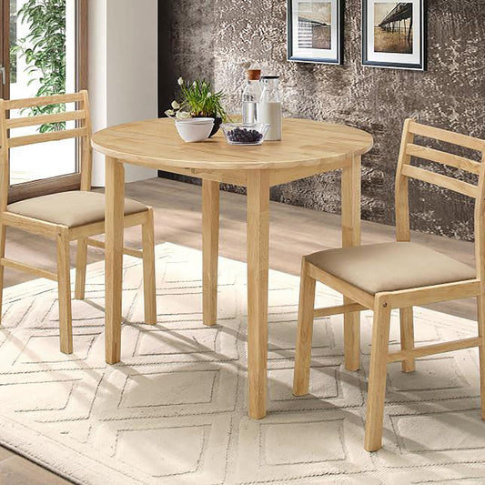 Round oak dining table with two beige upholstered chairs