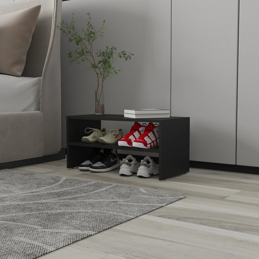 Black tier shoe rack with tan and red athletic shoes