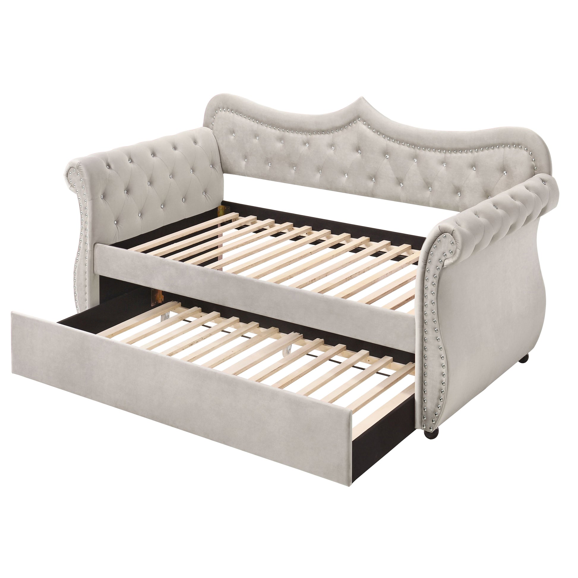 Elegant upholstered daybed with a pullout trundle and crystal tufting in beige velvet