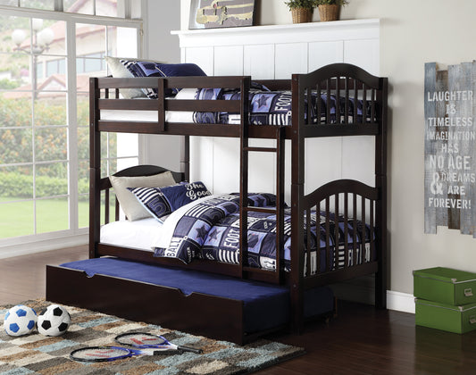 Dark brown wooden bunk bed with soccerthemed bedding and a pullout trundle