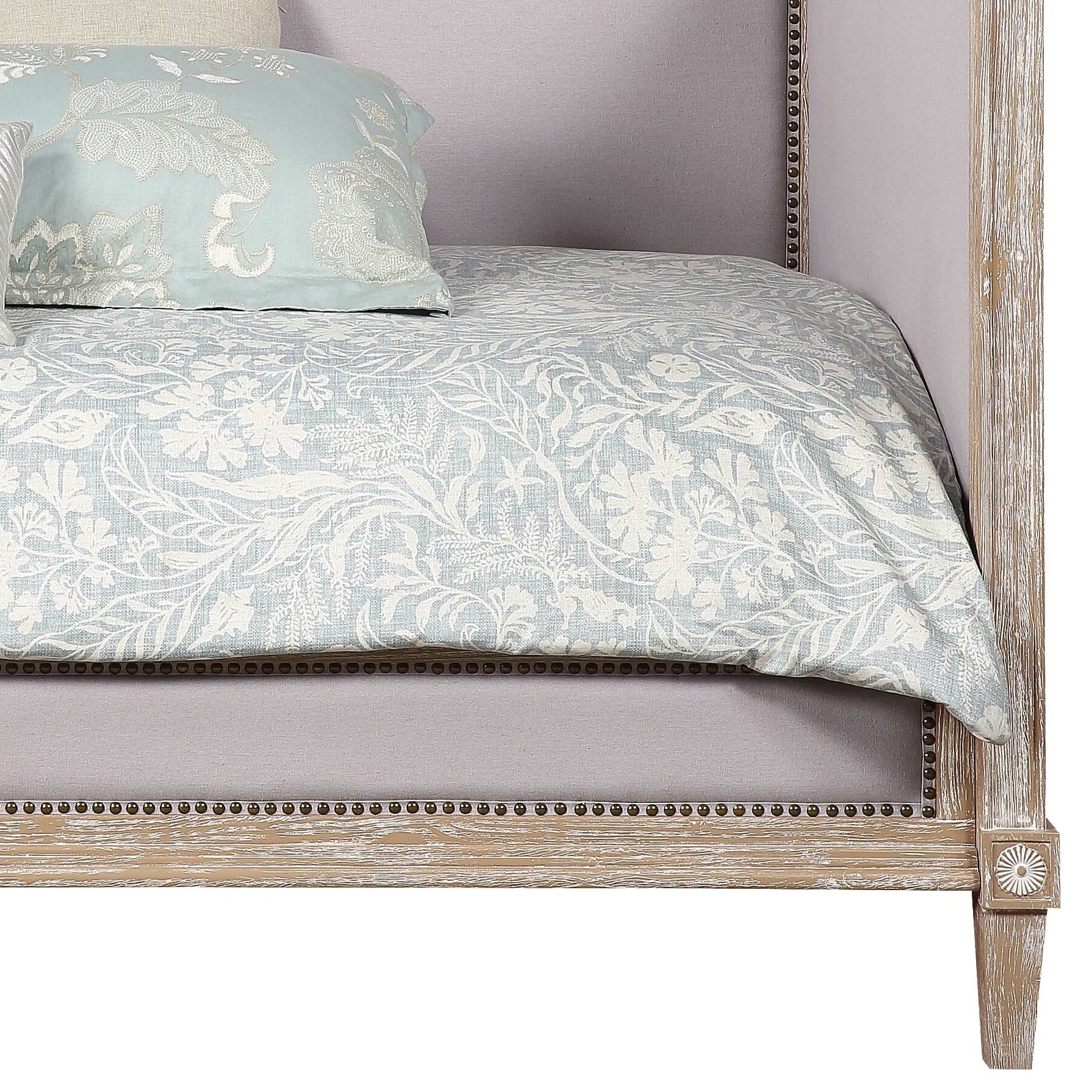 Light blue linen duvet cover with white floral print for a serene bedroom retreat