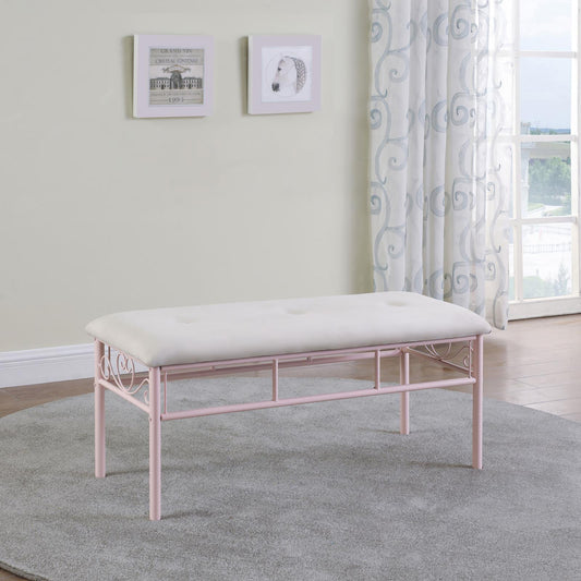 Tufted white upholstered bench with pink metal scrollwork frame perfect for entryway accent
