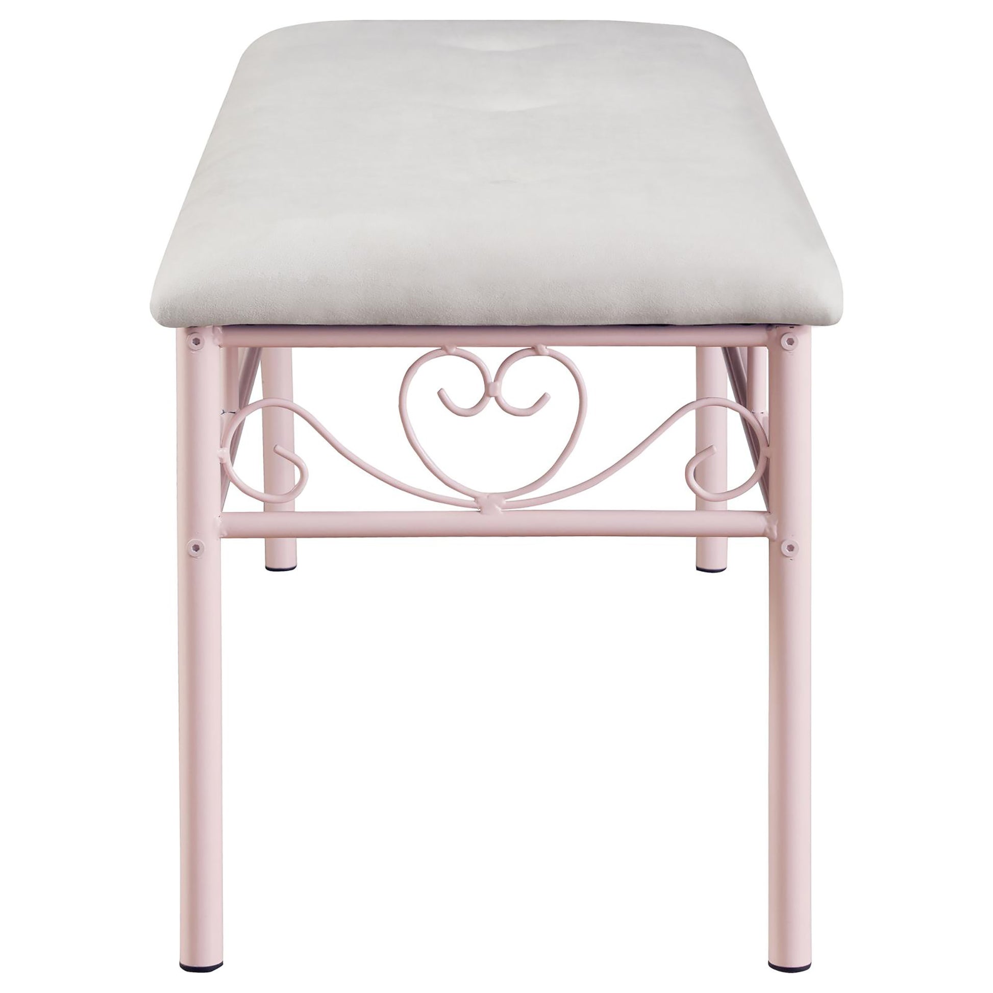 Pink metal bench with upholstered light gray seat and heart scroll design