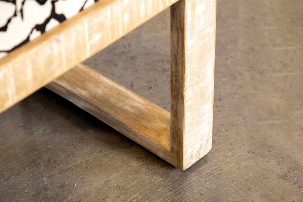 Natural wood coffee table frame with distressed finish