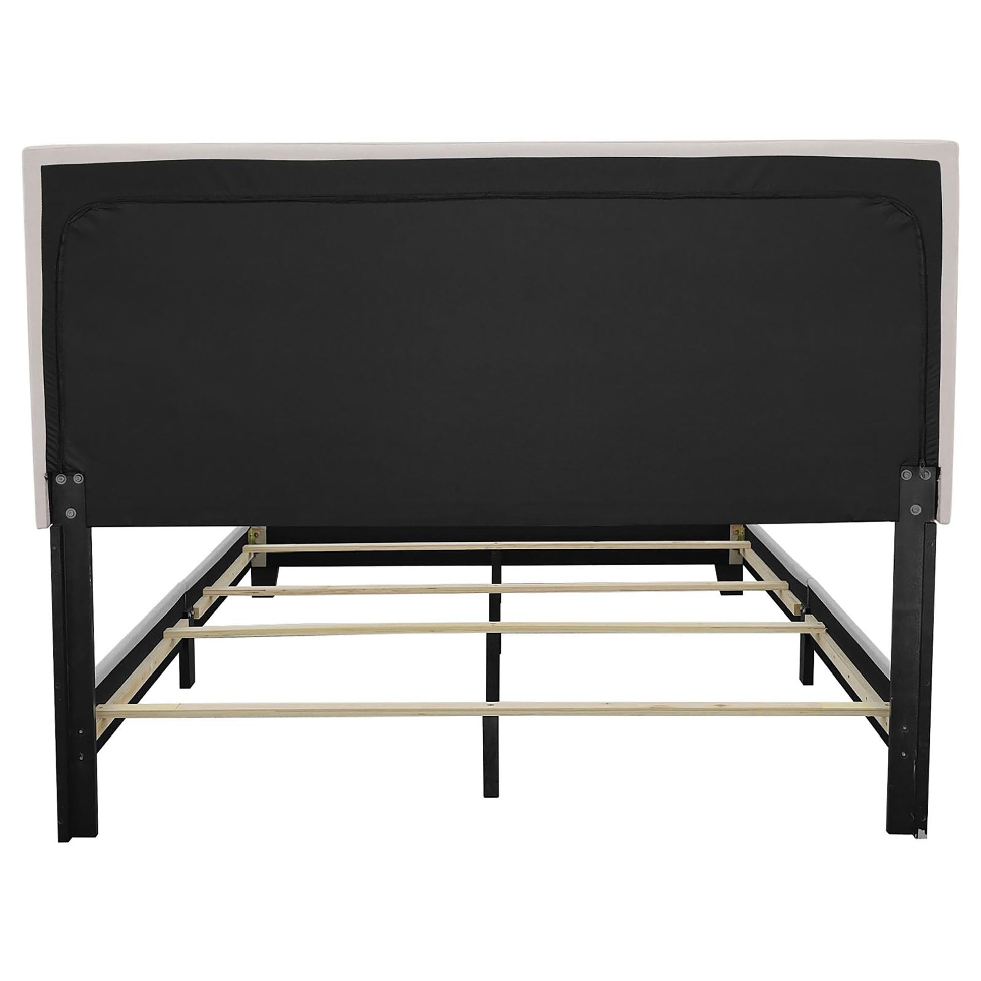 Upholstered bed frame with beige headboard and black fabric backing