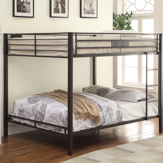 Dark bronze metal twin over twin bunk bed with patterned bedding and beige throw blanket