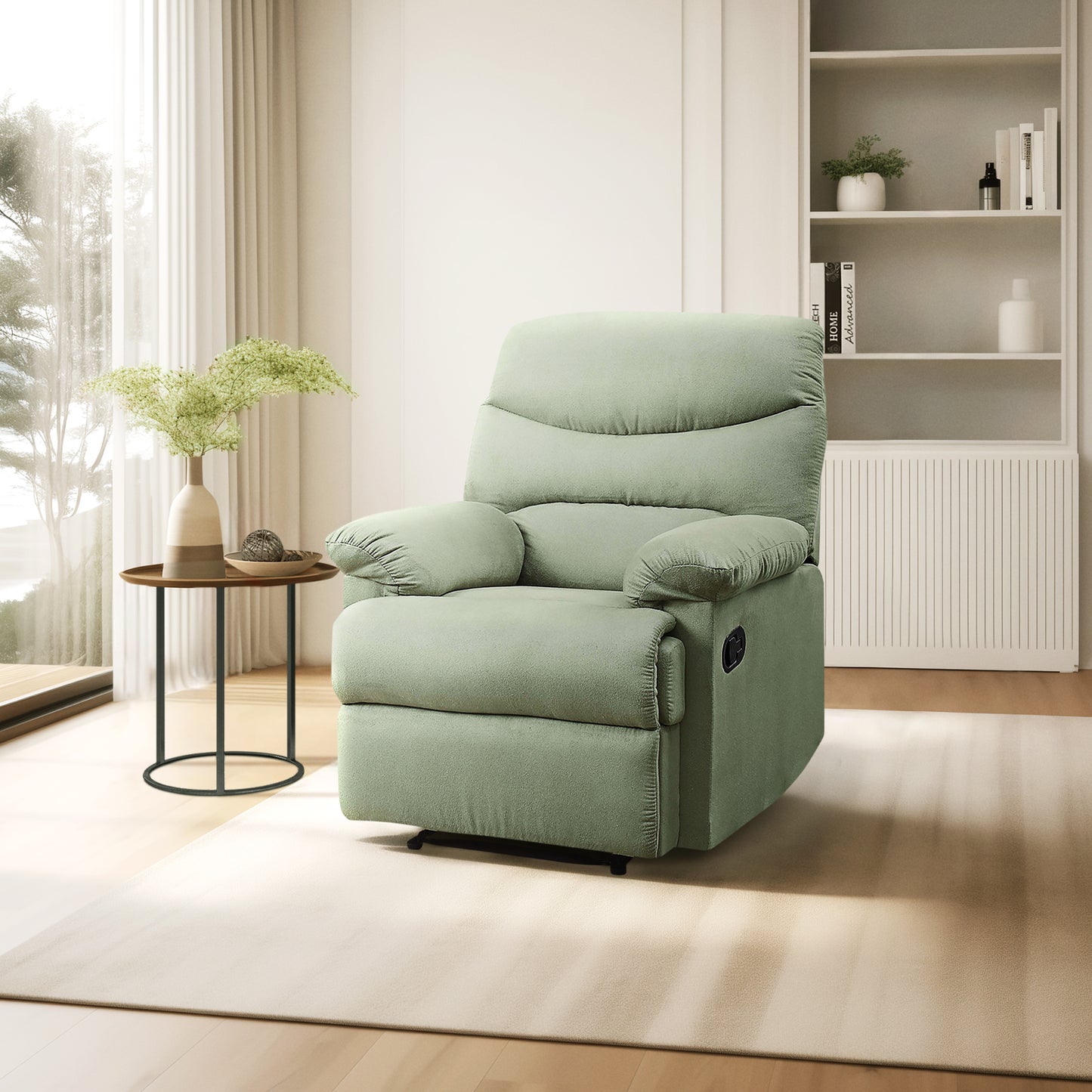 Sage green upholstered recliner chair with plush cushioning and a side lever