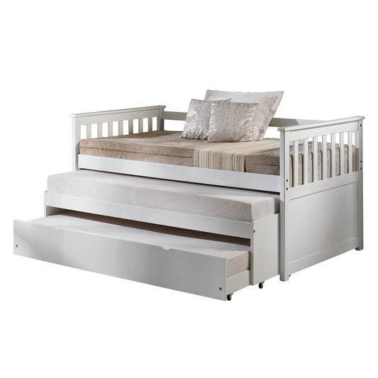 White wooden daybed with trundle featuring slatted sides and plush cushions