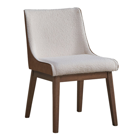 Cream boucle dining chair with brown faux leather trim and dark wood legs