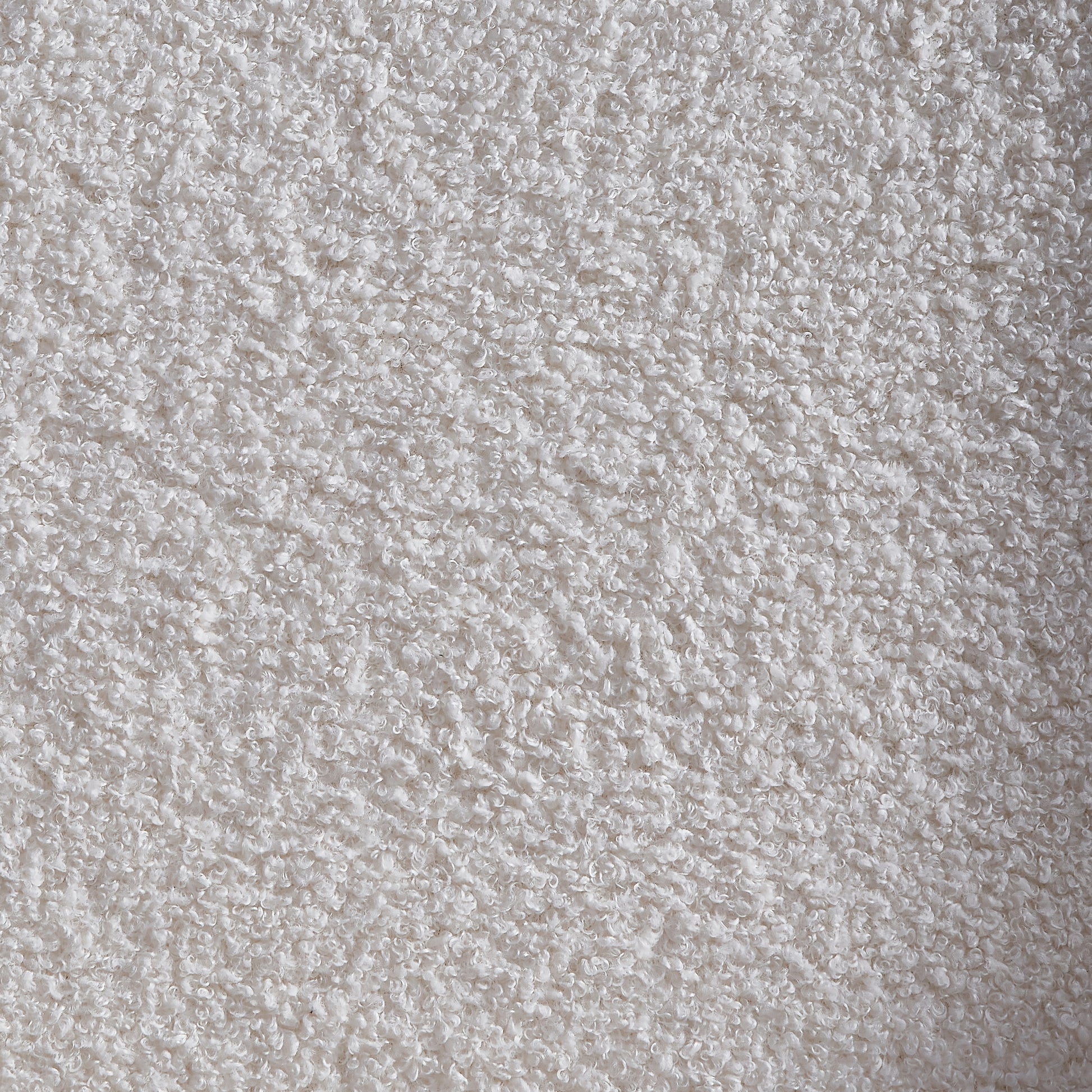 Cream boucle fabric texture closeup perfect for upholstery projects