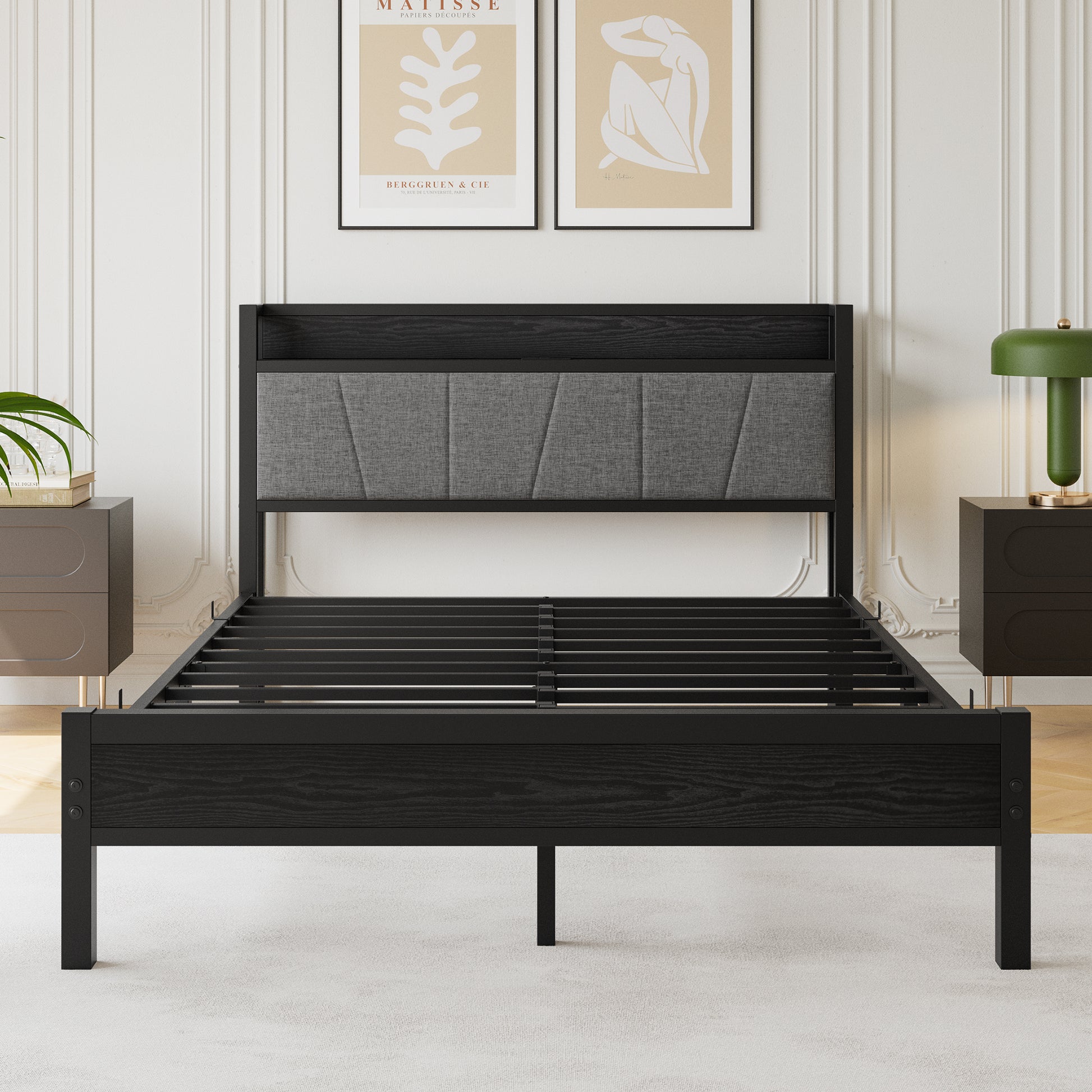 Black wood frame queen bed with upholstered grey headboard and metal slats