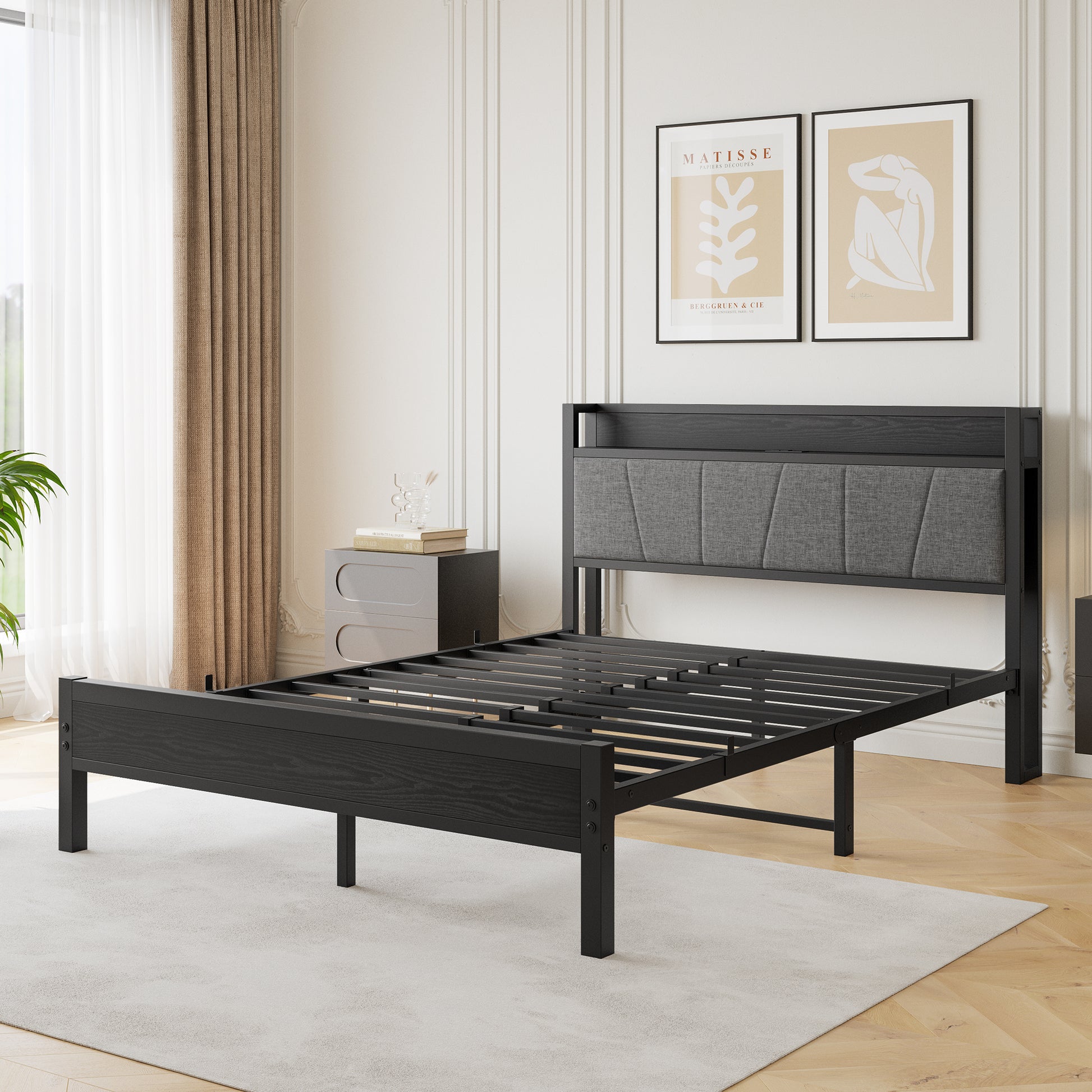 Black metal bed frame with upholstered grey headboard and dark wood accents