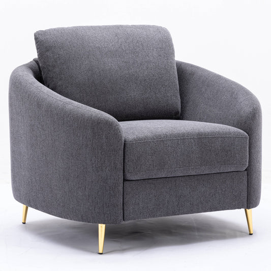 Dark gray fabric armchair with a comfortable cushion and gold tapered legs