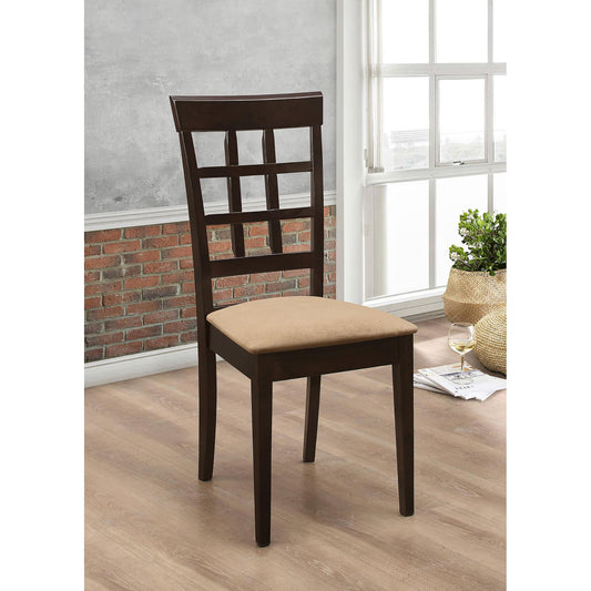 Dark wood dining chair with tan upholstered seat and lattice back