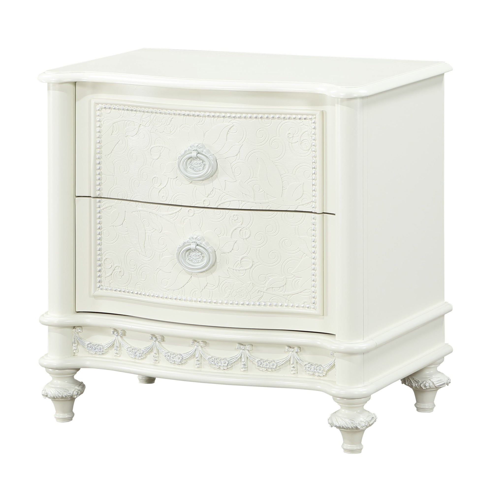 Cream ornate drawer nightstand with decorative carved detailing and ring pulls