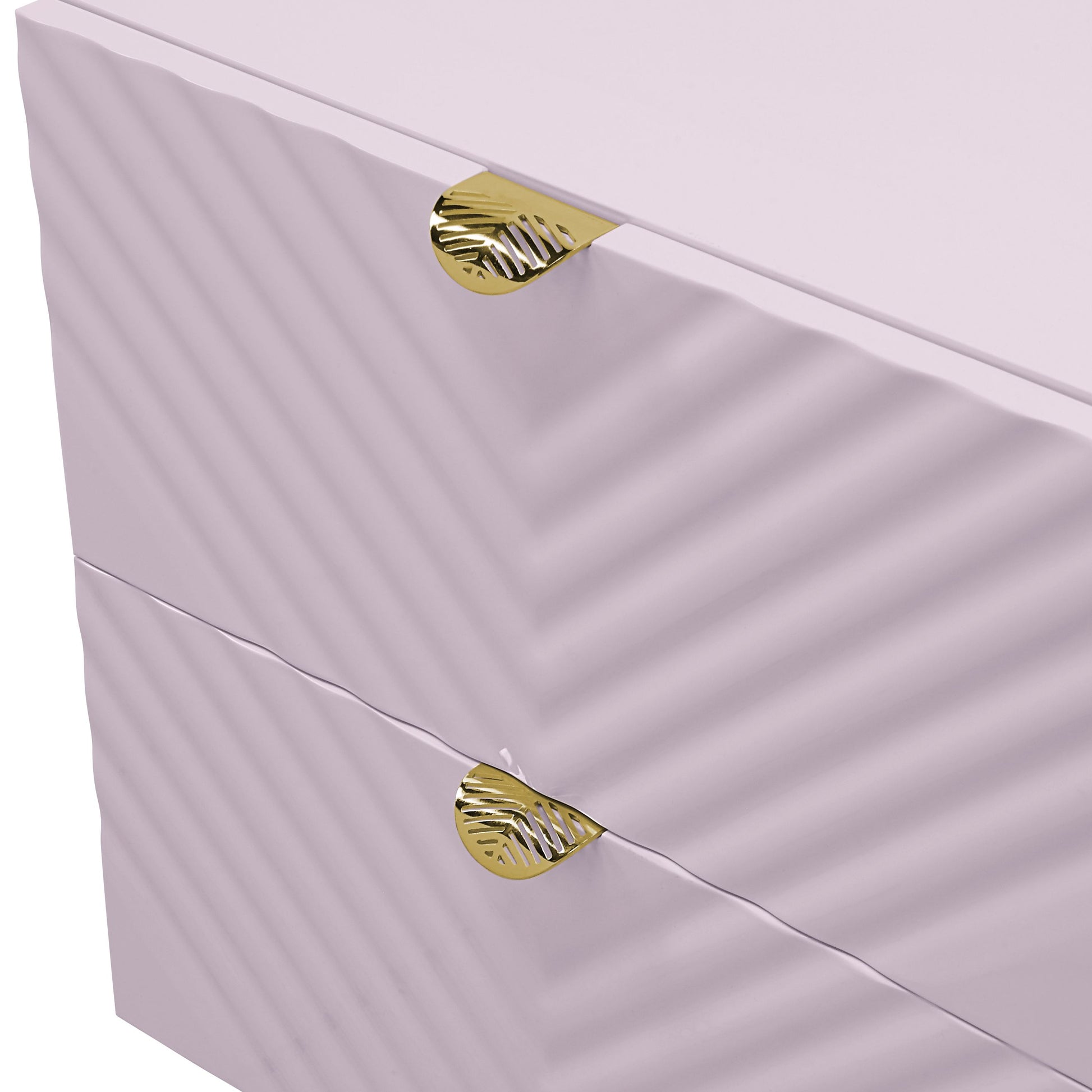 Light pink dresser with chevron texture and ornate gold leaf drawer pulls